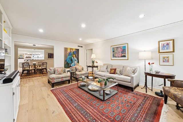 6227 Bandera Ave Unit D, Dallas, TX 75225 - living area featuring light wood-style flooring, ornamental molding, and recessed lighting