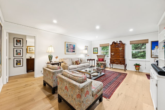 6227 Bandera Ave Unit D, Dallas, TX 75225 - living area featuring light wood-style flooring, ornamental molding, and recessed lighting