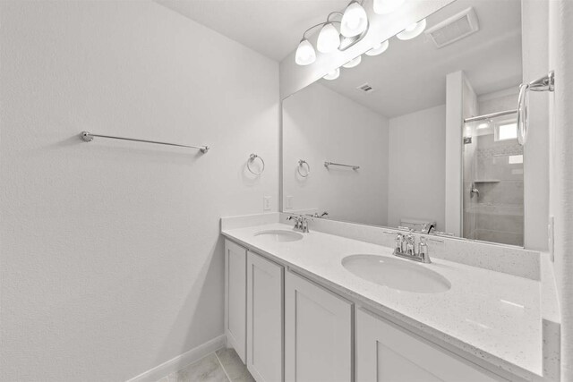 212 Griffith Dr, Princeton, TX 75407 - full bathroom with double vanity and a tile shower