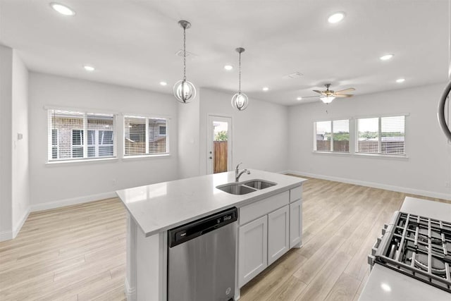 212 Griffith Dr, Princeton, TX 75407 - kitchen with dishwasher, light wood-type flooring, recessed lighting, open floor plan, and gas range oven