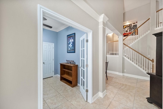 2213 Laura Elizabeth Trl, Mansfield, TX 76063 - hall featuring crown molding, light tile patterned floors, and stairway