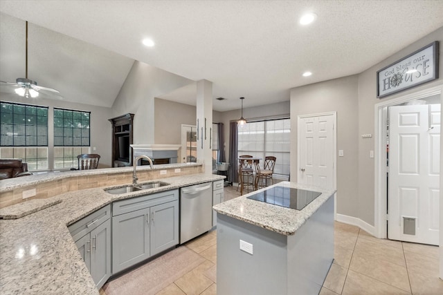 2213 Laura Elizabeth Trl, Mansfield, TX 76063 - kitchen with dishwasher, black electric stovetop, gray cabinetry, ceiling fan, and light stone counters