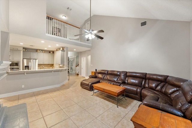 2213 Laura Elizabeth Trl, Mansfield, TX 76063 - living area with light tile patterned floors, ceiling fan, high vaulted ceiling, and recessed lighting