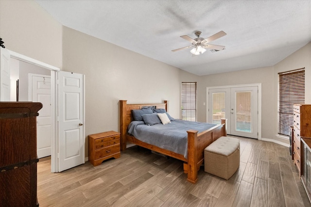2213 Laura Elizabeth Trl, Mansfield, TX 76063 - bedroom featuring access to outside, light wood-style flooring, french doors, a ceiling fan, and vaulted ceiling
