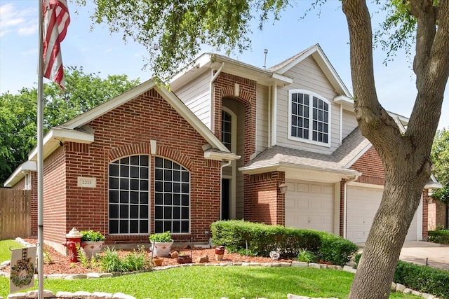 2213 Laura Elizabeth Trl, Mansfield, TX 76063 - traditional-style home with brick siding, a garage, driveway, and a front lawn