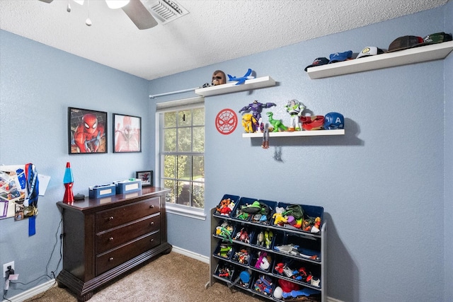 2213 Laura Elizabeth Trl, Mansfield, TX 76063 - rec room featuring carpet flooring, ceiling fan, and a textured ceiling