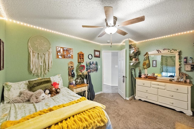 2213 Laura Elizabeth Trl, Mansfield, TX 76063 - bedroom with carpet flooring, a textured ceiling, and a ceiling fan