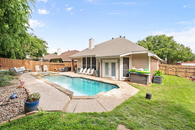 2213 Laura Elizabeth Trl, Mansfield, TX 76063 - view of swimming pool featuring a fenced backyard, a sunroom, french doors, and a patio area