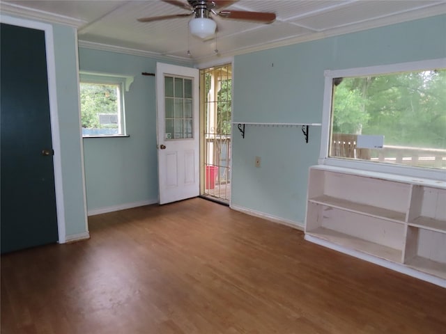 9066 Orinoco Dr, Dallas, TX 75217 - entrance foyer with a ceiling fan, wood finished floors, and ornamental molding