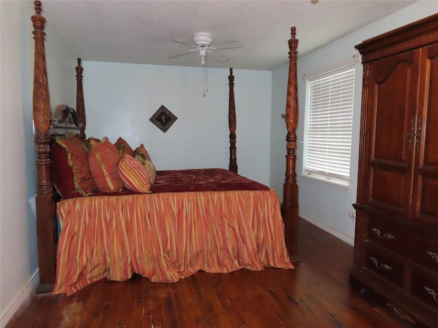 9066 Orinoco Dr, Dallas, TX 75217 - bedroom featuring dark wood-style floors and ceiling fan