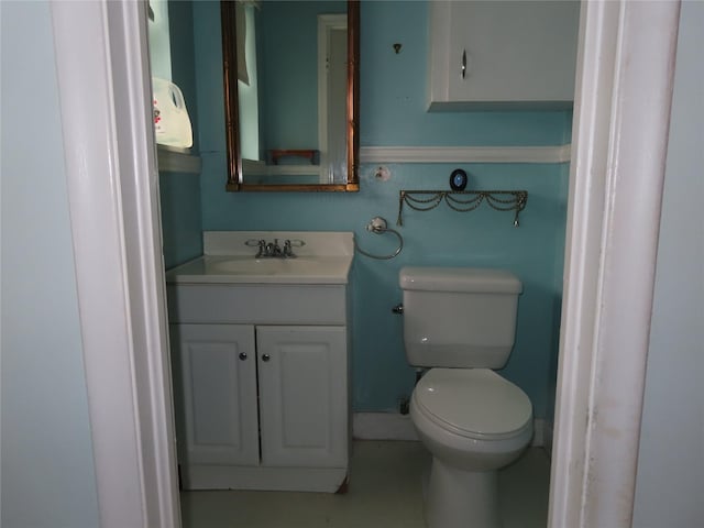 9066 Orinoco Dr, Dallas, TX 75217 - half bathroom with vanity and toilet