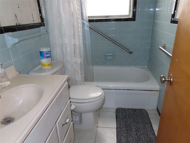 9066 Orinoco Dr, Dallas, TX 75217 - bathroom with vanity, shower / bath combo, tile patterned floors, and tile walls