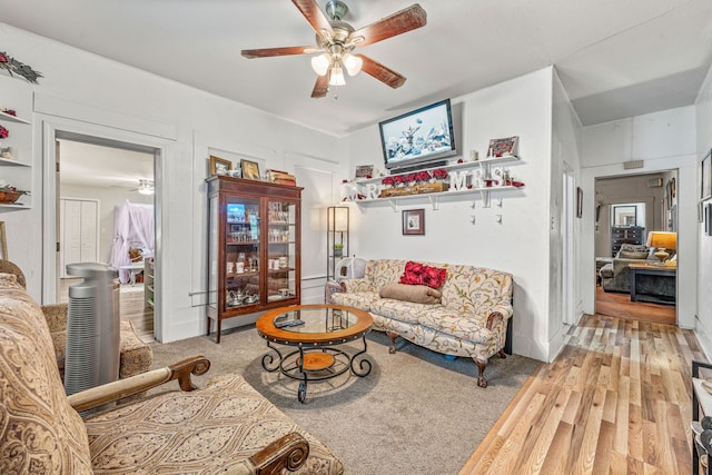 509 W Reynosa Ave, De Leon, TX 76444 - living room featuring ceiling fan and wood finished floors
