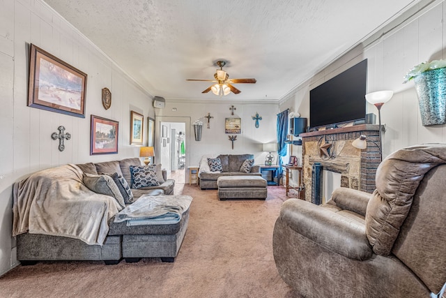509 W Reynosa Ave, De Leon, TX 76444 - carpeted living area featuring ornamental molding, a ceiling fan, a fireplace, and a textured ceiling