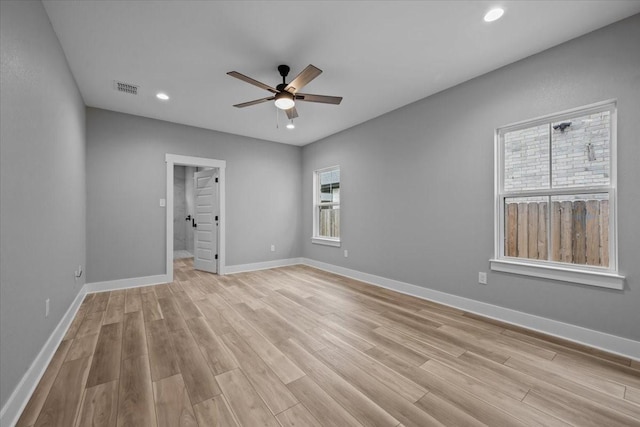 13017 Rainier, Woodway, TX 76712 - empty room featuring ceiling fan, light wood finished floors, and recessed lighting