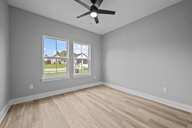 13017 Rainier, Woodway, TX 76712 - unfurnished room with light wood finished floors and a ceiling fan