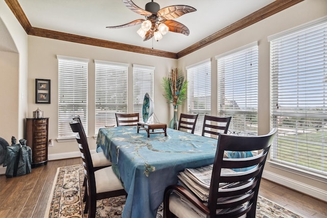 4105 Claridge Ter, Garland, TX 75043 - dining room featuring ceiling fan, wood-type flooring, and crown molding