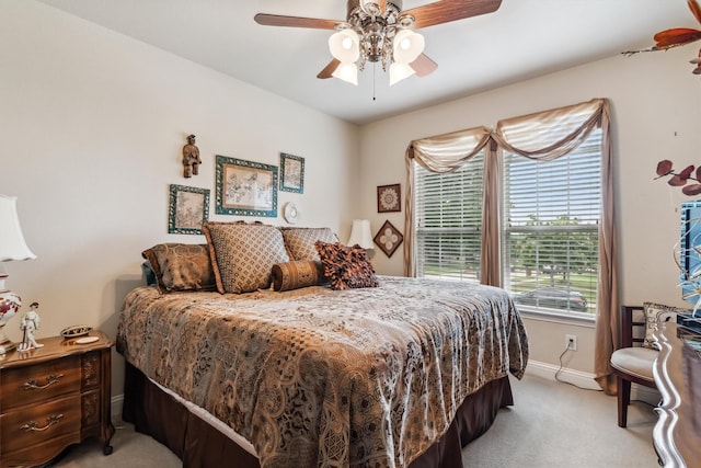 4105 Claridge Ter, Garland, TX 75043 - bedroom with light colored carpet and a ceiling fan