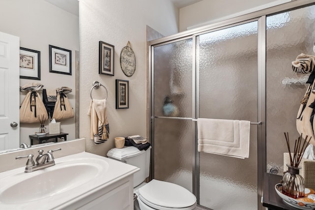 4105 Claridge Ter, Garland, TX 75043 - full bath featuring a shower stall, vanity, and a textured wall