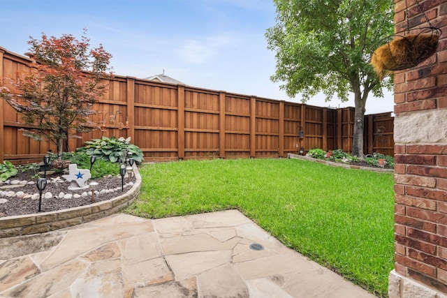 4105 Claridge Ter, Garland, TX 75043 - fenced backyard featuring a patio area