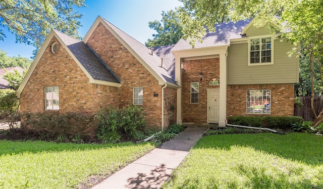 748 Arbor Creek Dr, Desoto, TX 75115 - traditional-style house with brick siding and a shingled roof