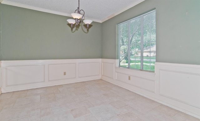 748 Arbor Creek Dr, Desoto, TX 75115 - spare room featuring a chandelier, a decorative wall, a textured ceiling, and a wainscoted wall