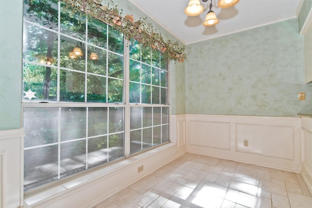 748 Arbor Creek Dr, Desoto, TX 75115 - unfurnished room featuring ornamental molding, a wainscoted wall, and a decorative wall