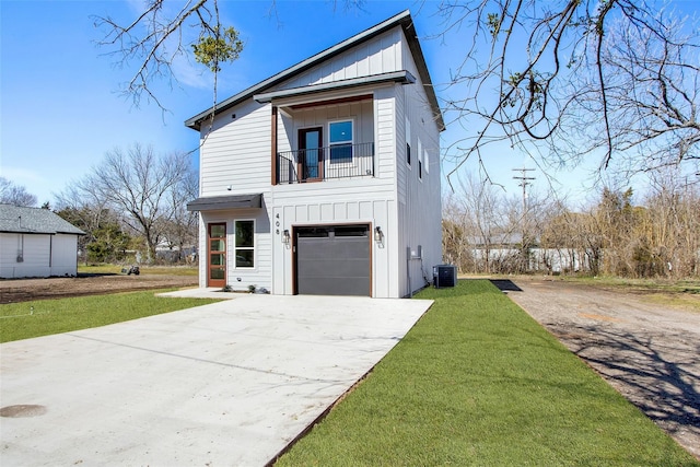 408 Grayson, Leonard, TX 75452 - view of front of house with board and batten siding, a balcony, driveway, an attached garage, and a front yard