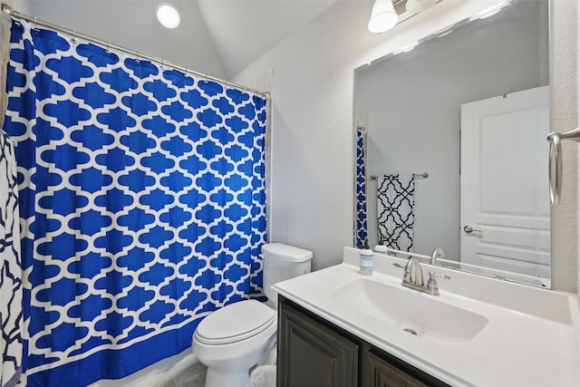 1008 Snowbird Dr, Little Elm, TX 75068 - bathroom with vanity, a shower with curtain, a textured wall, and lofted ceiling