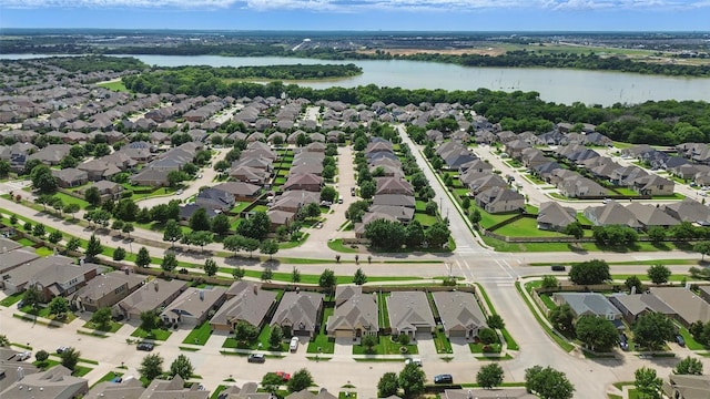 1008 Snowbird Dr, Little Elm, TX 75068 - aerial view of property and surrounding area featuring nearby suburban area and a large body of water
