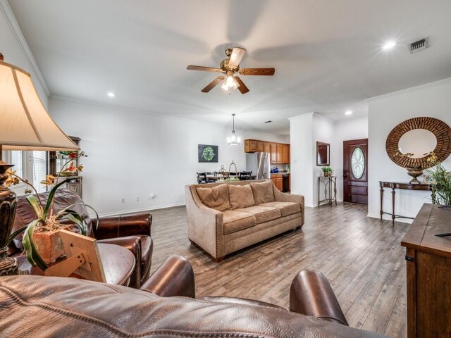 400 Autry Blvd, Gunter, TX 75058 - living room with a ceiling fan, ornamental molding, wood finished floors, and recessed lighting