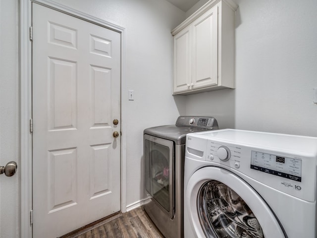 400 Autry Blvd, Gunter, TX 75058 - laundry room featuring cabinet space, independent washer and dryer, and wood finished floors