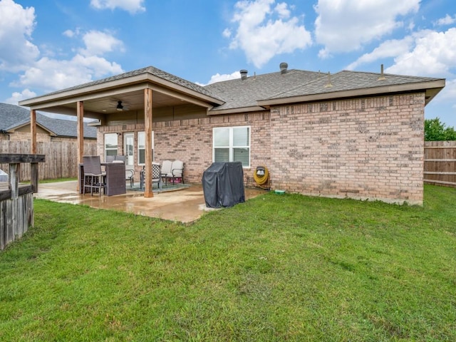 400 Autry Blvd, Gunter, TX 75058 - rear view of property with a fenced backyard, brick siding, a patio area, a shingled roof, and a ceiling fan