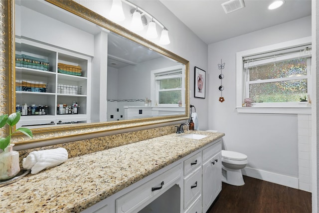 209 Walnut St, Sanger, TX 76266 - full bath with wood finished floors and vanity