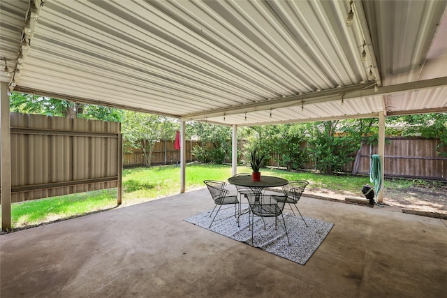 209 Walnut St, Sanger, TX 76266 - fenced backyard featuring a patio area and outdoor dining area