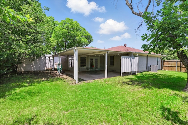 209 Walnut St, Sanger, TX 76266 - rear view of property featuring a patio area and french doors