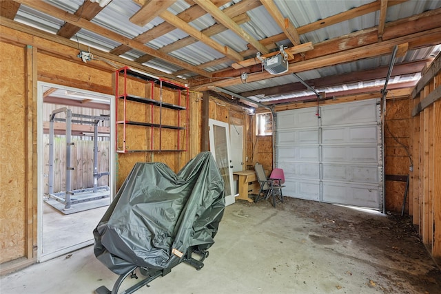 209 Walnut St, Sanger, TX 76266 - garage featuring a garage door opener
