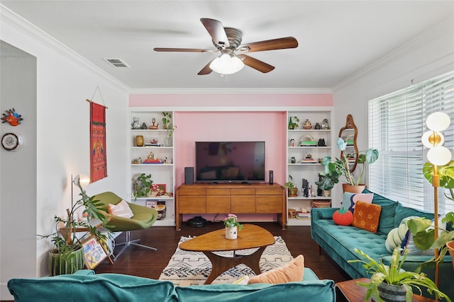 209 Walnut St, Sanger, TX 76266 - living area featuring crown molding, a ceiling fan, built in features, and wood finished floors