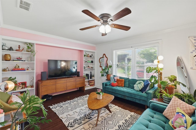 209 Walnut St, Sanger, TX 76266 - living area featuring dark wood-style floors, a ceiling fan, ornamental molding, and built in features