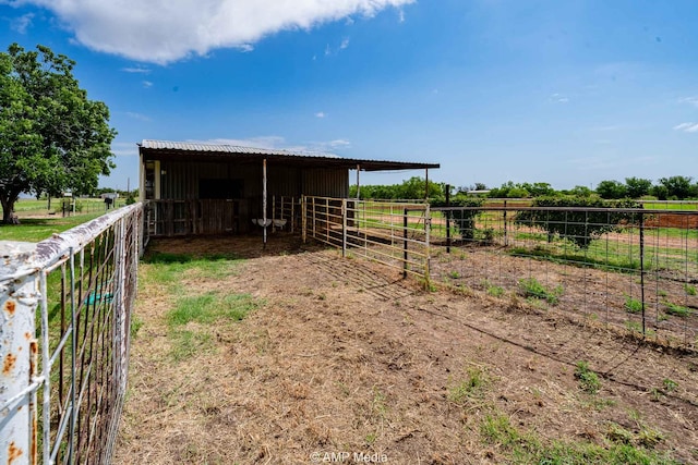 2306 County Road 475, Anson, TX 79501 - view of outdoor structure with an exterior structure and a view of countryside