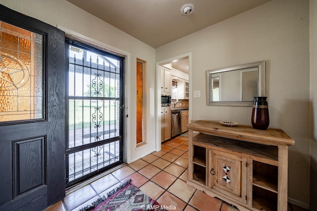 2306 County Road 475, Anson, TX 79501 - foyer with light tile patterned floors