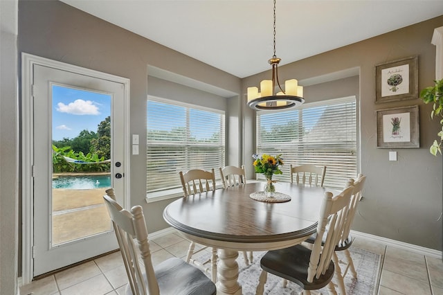 1330 Scarboro Hills Ln, Rockwall, TX 75087 - dining space featuring a chandelier and light tile patterned floors