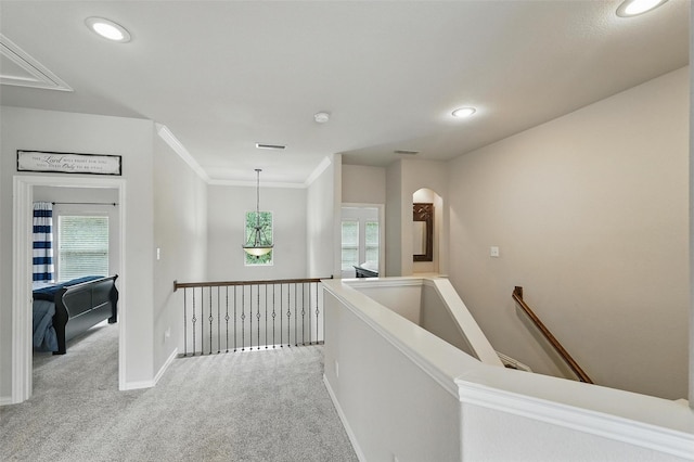 1330 Scarboro Hills Ln, Rockwall, TX 75087 - hallway with an upstairs landing, carpet flooring, healthy amount of natural light, recessed lighting, and ornamental molding