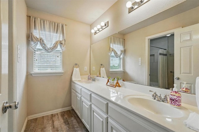 1330 Scarboro Hills Ln, Rockwall, TX 75087 - full bath featuring double vanity, wood finished floors, and a shower with shower curtain