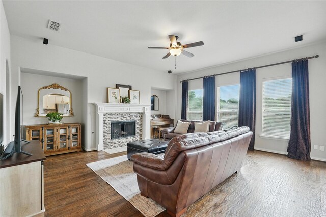 1330 Scarboro Hills Ln, Rockwall, TX 75087 - living room with a ceiling fan, a tile fireplace, and wood finished floors