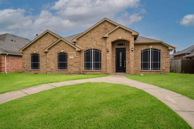 908 Trinity Dr, Lancaster, TX 75146 - french provincial home with brick siding and roof with shingles