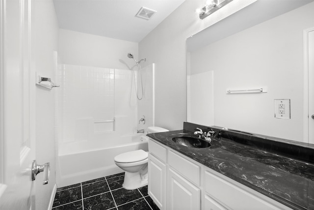 908 Trinity Dr, Lancaster, TX 75146 - bathroom featuring vanity and shower / bathtub combination