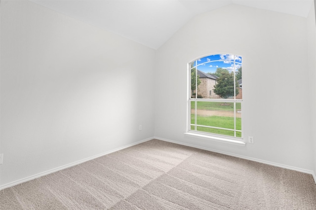 908 Trinity Dr, Lancaster, TX 75146 - unfurnished room featuring carpet and lofted ceiling