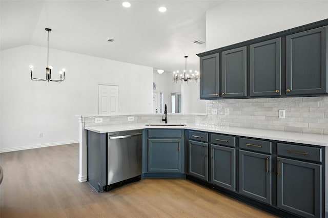 713 Madeline Ct, Azle, TX 76020 - kitchen featuring dishwasher, a chandelier, light wood finished floors, decorative backsplash, and vaulted ceiling