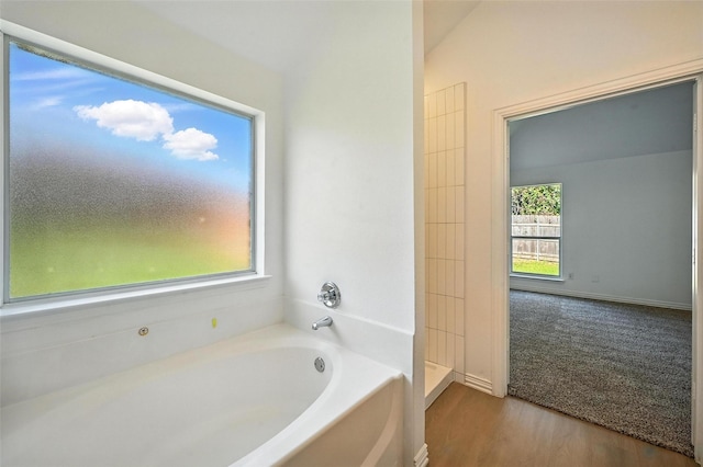 713 Madeline Ct, Azle, TX 76020 - full bath with a bath and wood finished floors